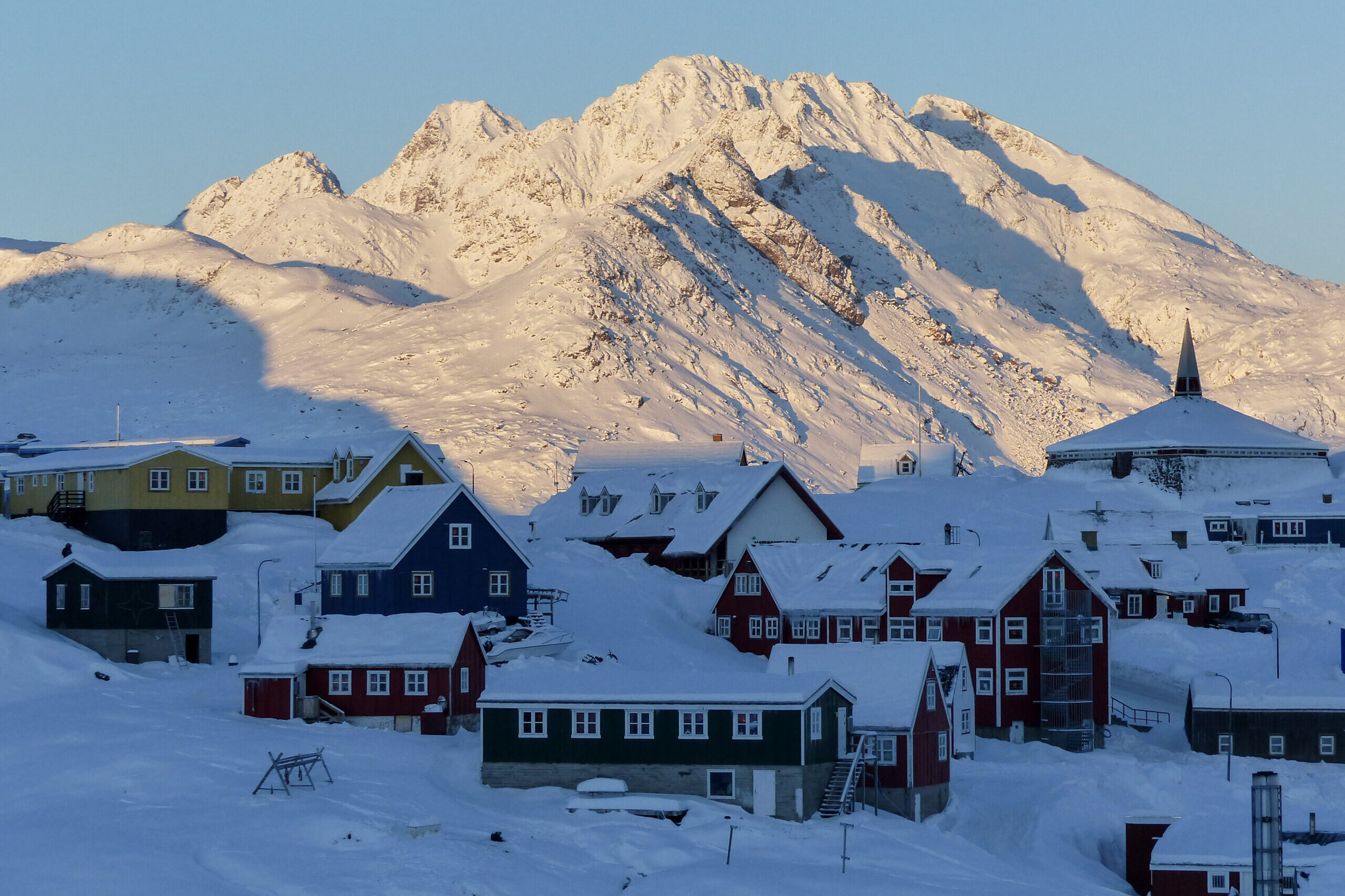 Winter view over the town center of Tasiilaq. Photo by Anna Burdenski - Visit East Greenland