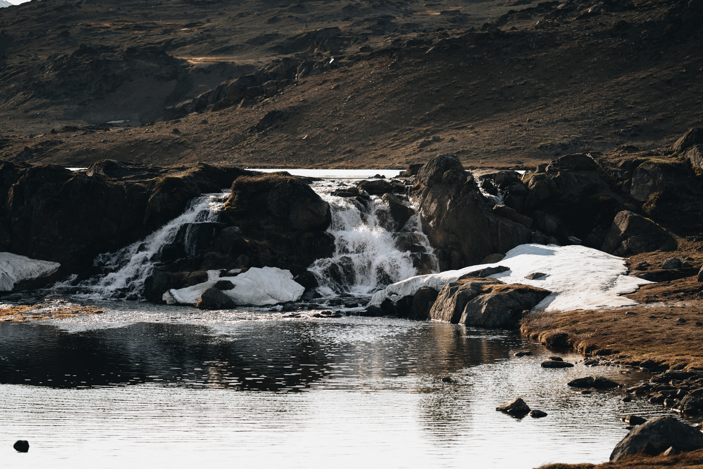 Picturesque Waterfall in the Flower Valley. Photo by Filip Gielda - Visit East Greenland