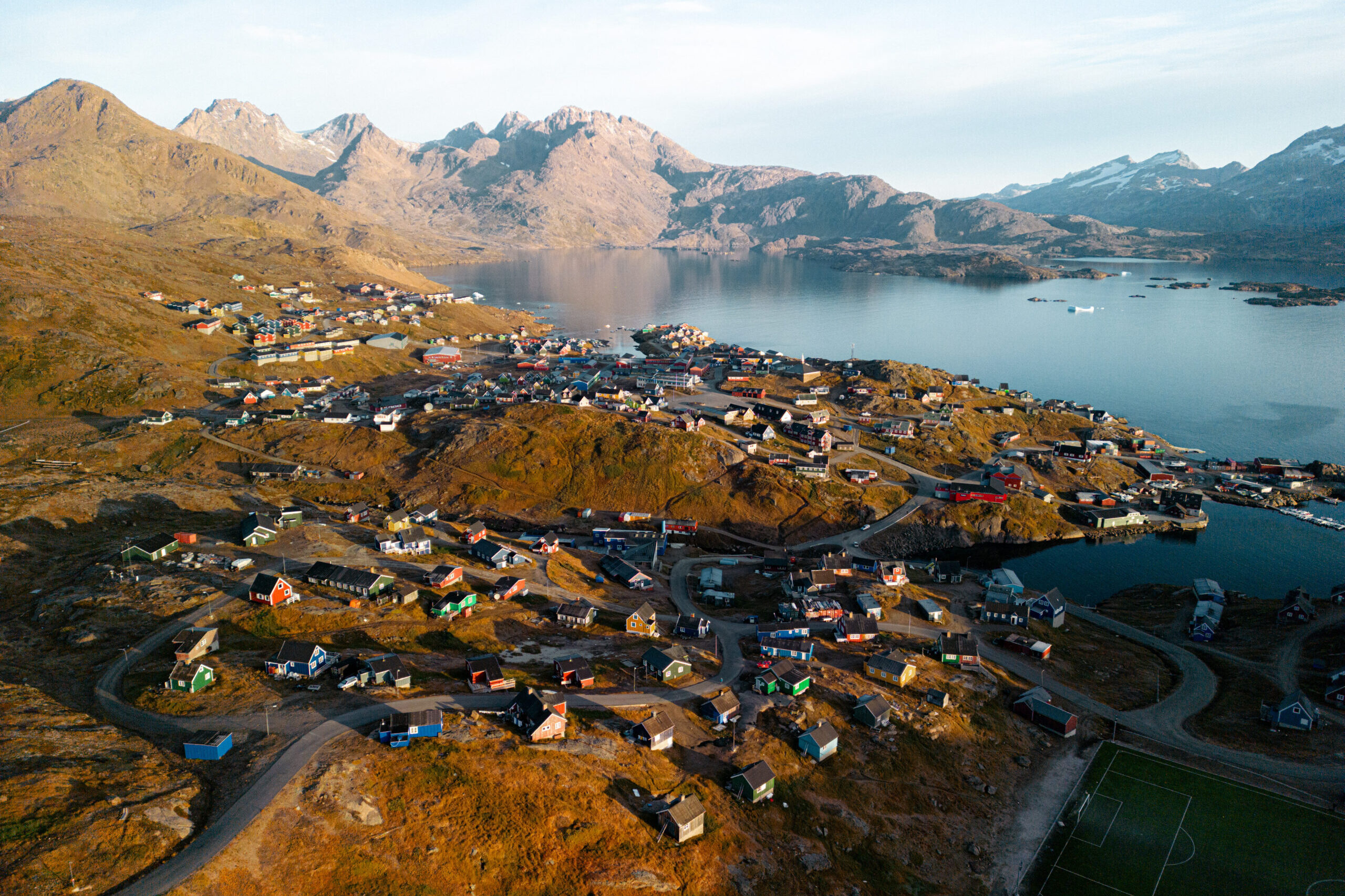 View over Tasiilaq towards the end of the fjord. Photo by Chris Koenig - Visit Greenland