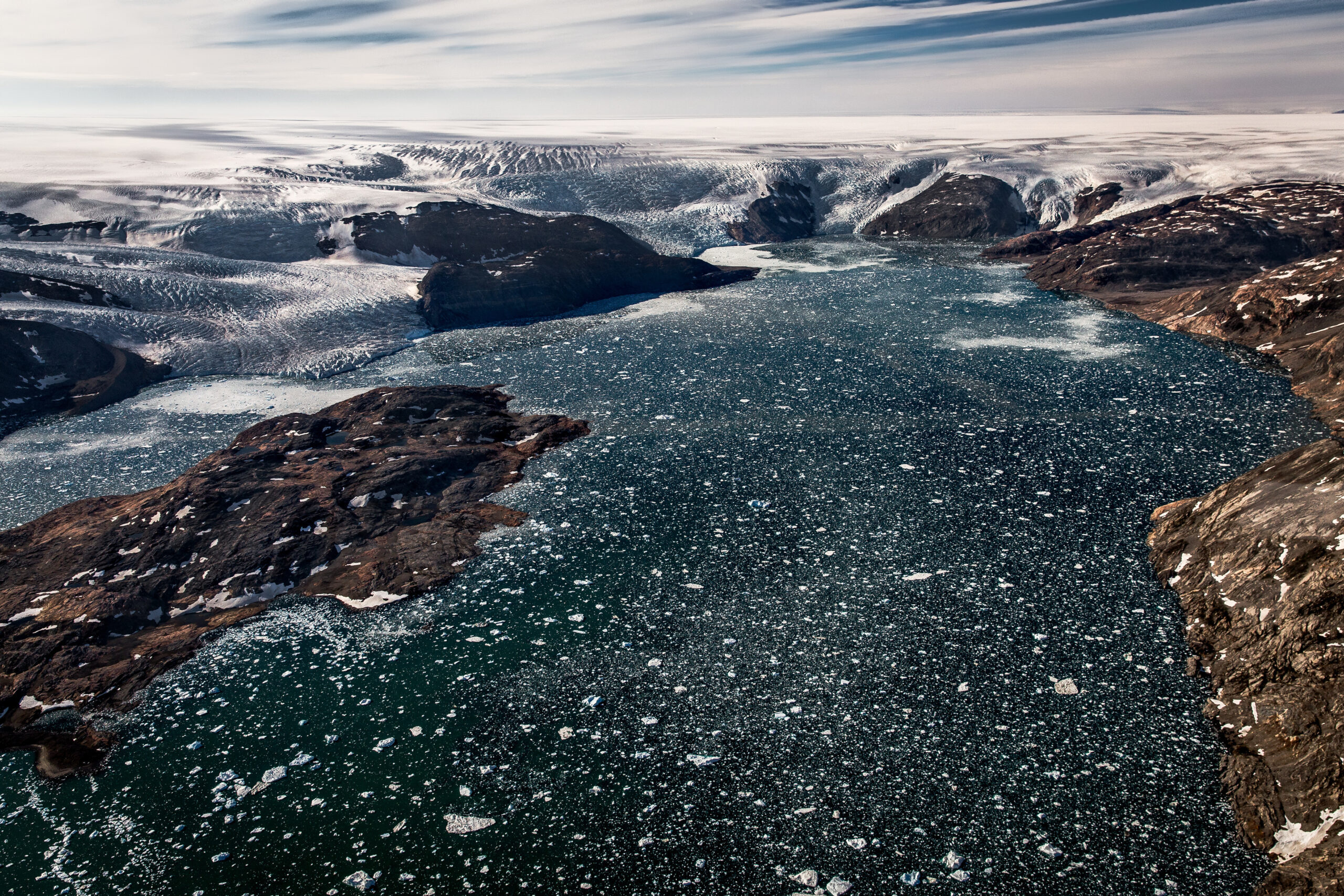 Five glaciers in Johan Petersens Fjord in East Greenland flow from the Greenland Ice Sheet. Photo by Mads Pihl / Air Zafari - Visit Greenland
