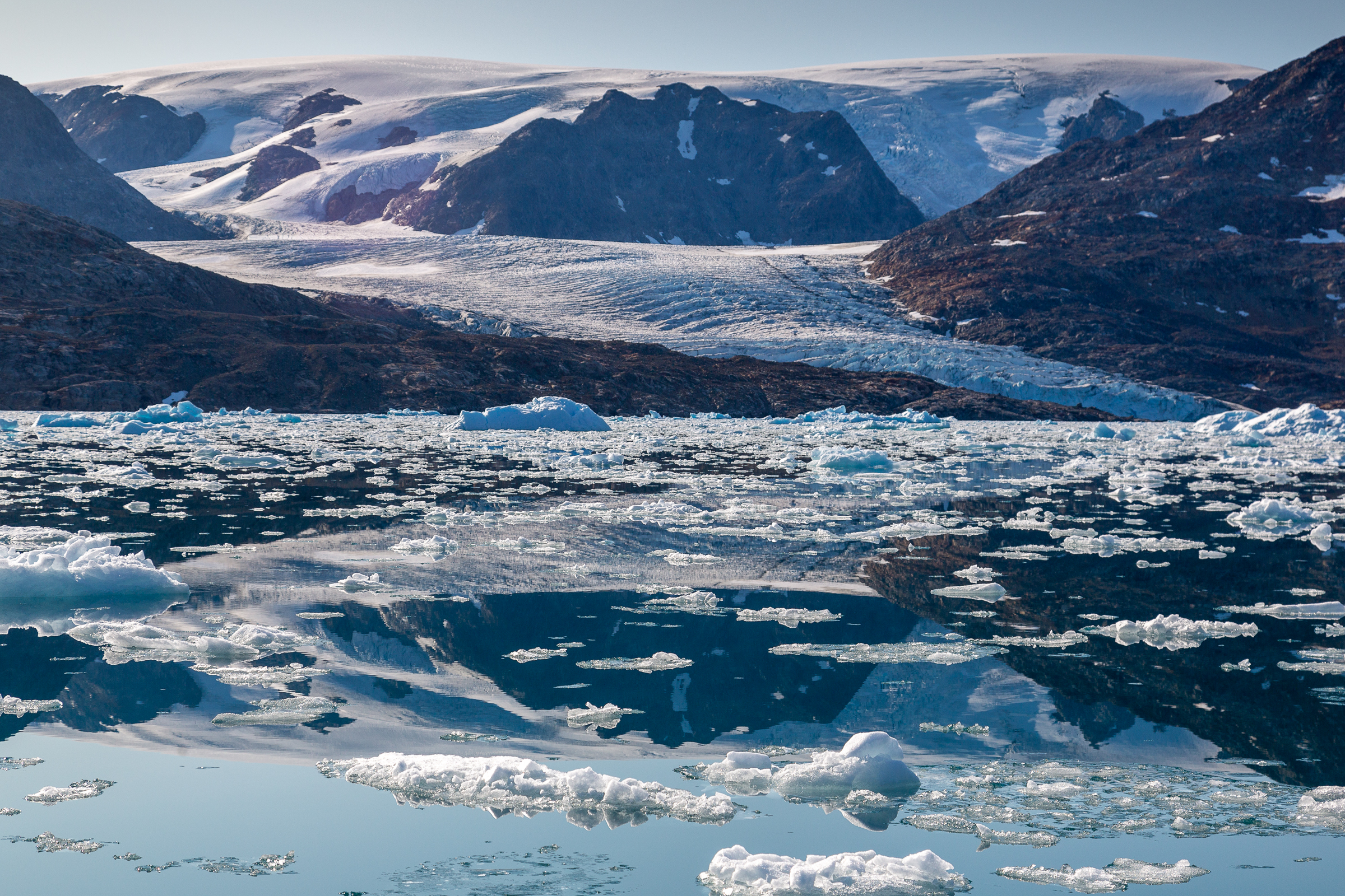 Impressive view over mountain, glacier and icebergs. Photo by Lars Anker Moeller - Visit East Greenland