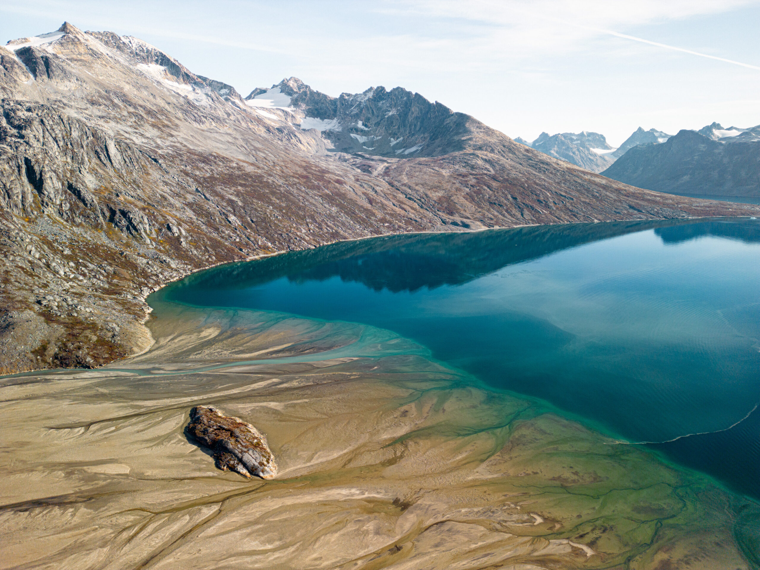 Mesmerizing blue water landscape in East Greenland. Photo by Chris Koenig - Visit Greenland