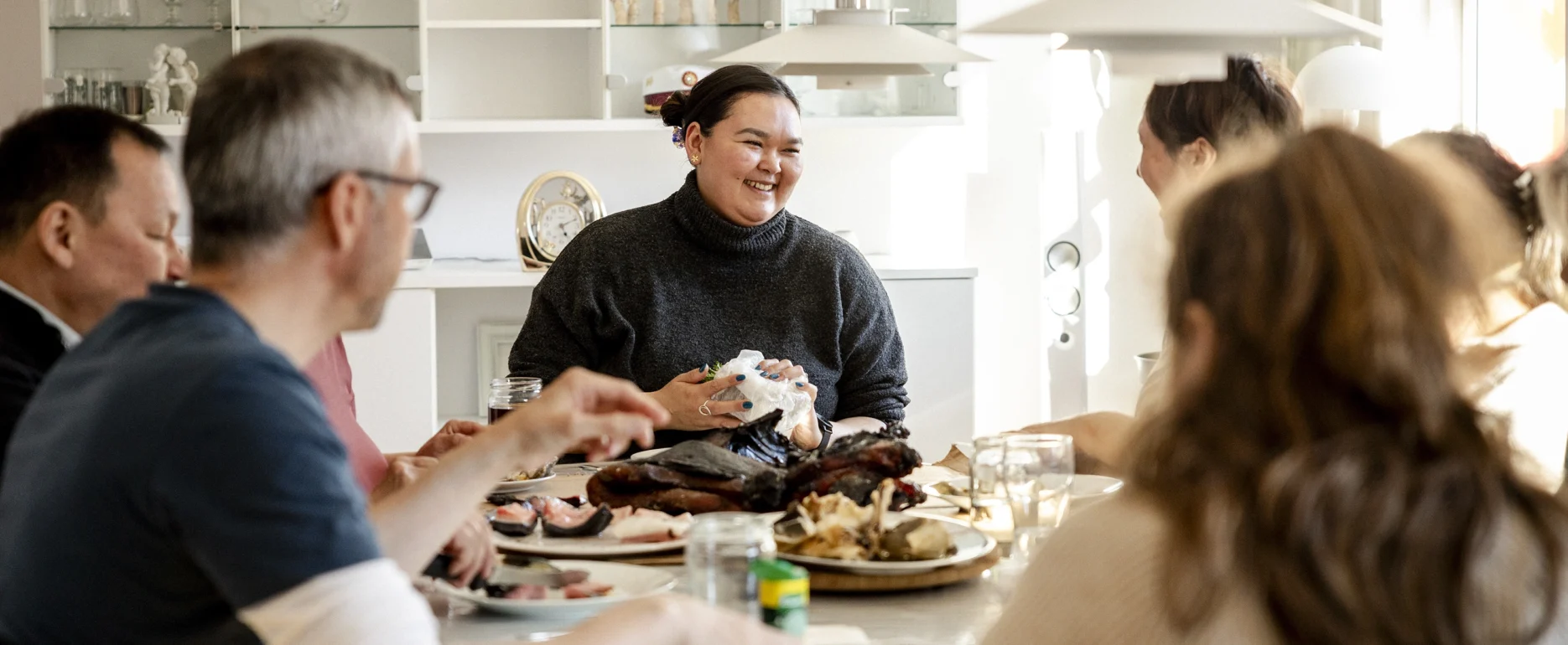 Eating at a private home in Tasiilaq, East Greenland. Photo by Oscar Scott Carl - Visit East Greenland